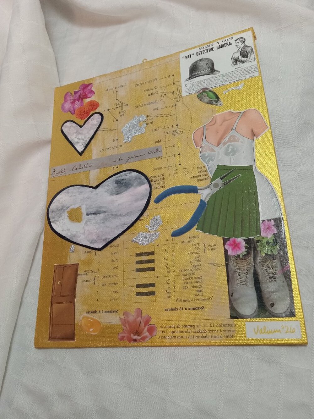 Prints of old magazines on canvas, gold paint, and mixed-media collages